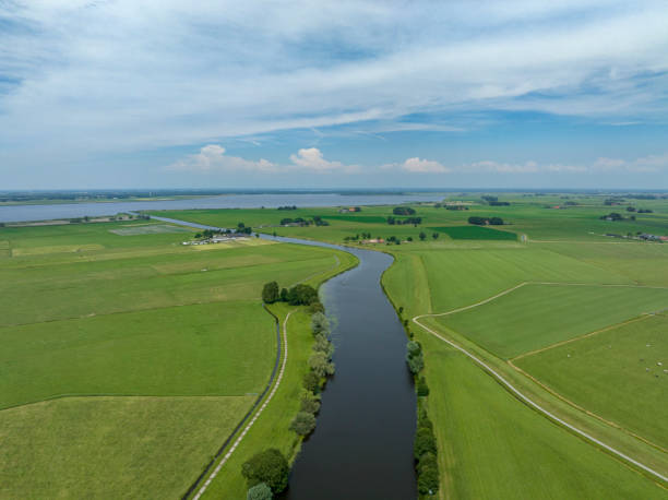 istock Rural landscape with a river through the meadows seen from above 2181485528