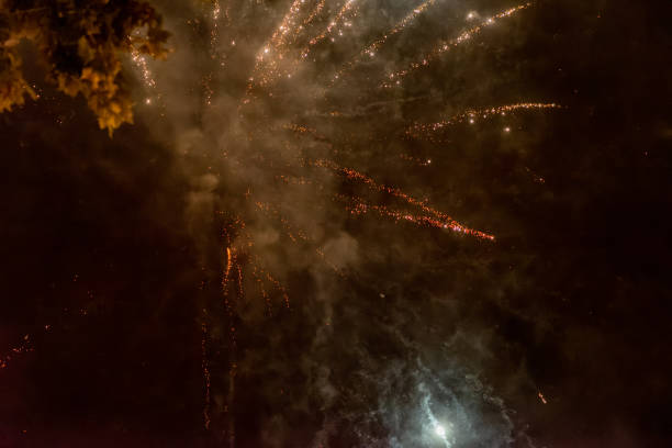 istock Red and Green Fireworks Display in Night Sky 2181489069