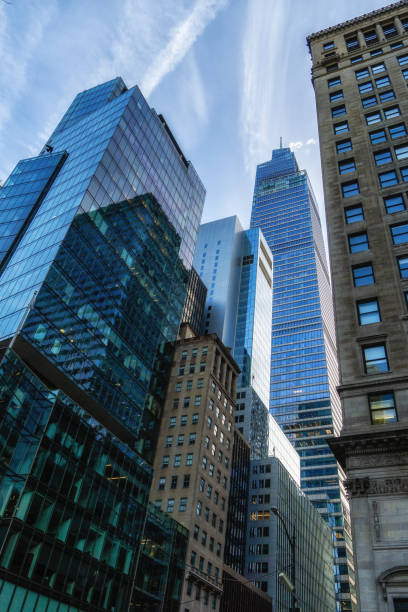 New York City Lower Manhattan, Downtown Financial District or Midtown business architecture, United States. High-rise skyscrapers, office buildings, USA. American urban street, real estate, realty.