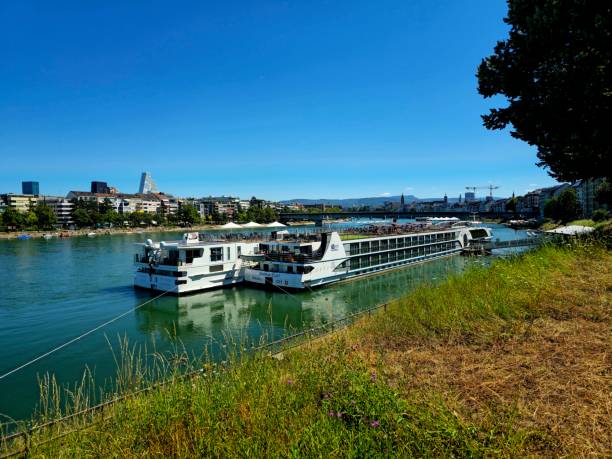 Basel St.Johann excursion boat terminal. The image shows two large rhine excursion ships captured during summer season.