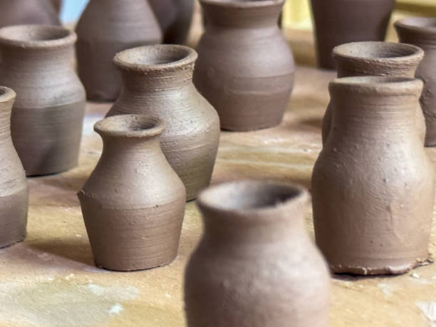 istock Miniature clay vases created during a ceramics masterclass. A fine example of craftsmanship and delicate handwork, each vase is unique and crafted with special care. 2181510225