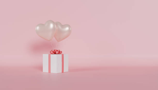 Pink gift box with a red ribbon, a perfect present for Valentine's Day
