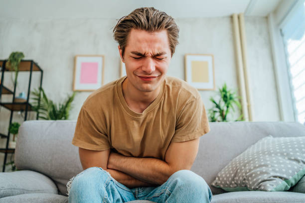 istock Man suffering from stomach pain 2181518447