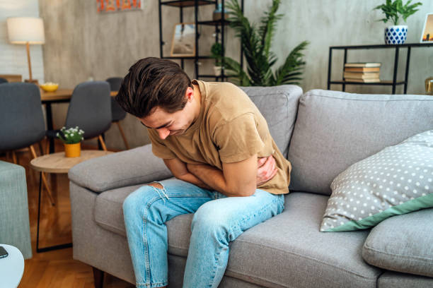 istock Man suffering from stomach pain 2181519537