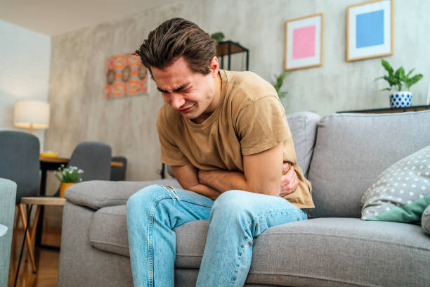 istock Man suffering from stomach pain 2181519596