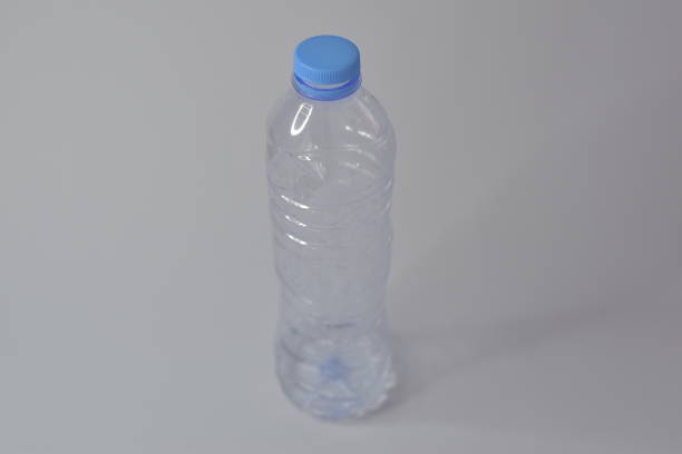 transparent mineral water bottle with white background