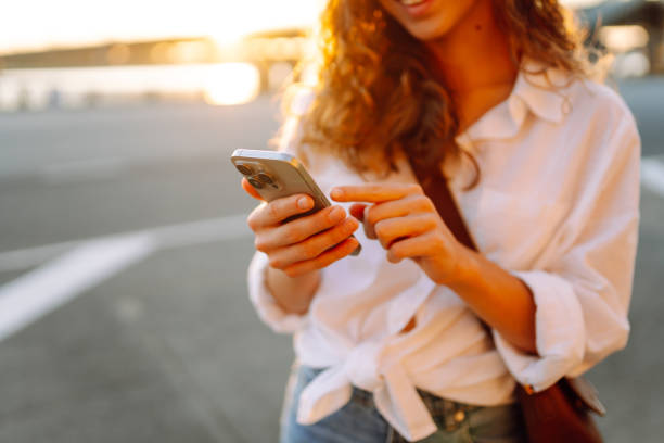 istock Phone in woman's hands. Communication with friends. 2181527493