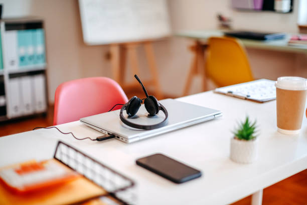 istock Photo of modern office with employee on a break 2181530800