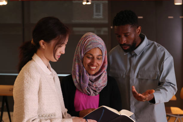 istock Diverse group of business people discussing in office 2181532996