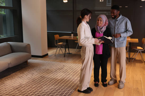 istock Diverse group of business people discussing in office 2181533011