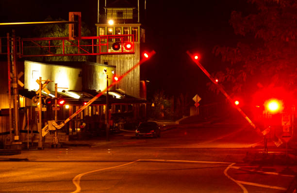 istock IMG_9023 Railroad crossing at night 2181533605