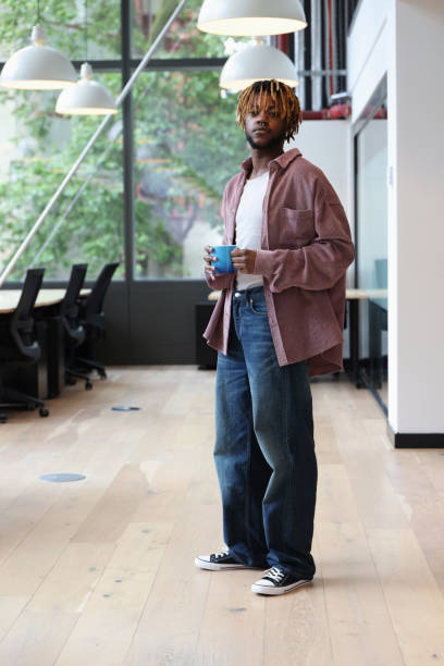 istock Young businessman standing in office 2181534704