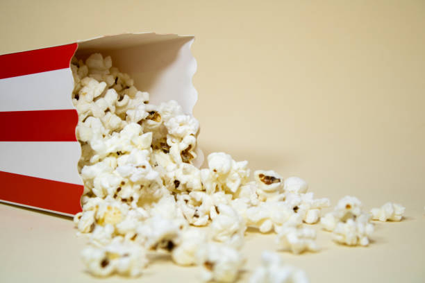 istock Close up of a fallen cardboard bucket with popcorn 2181537511