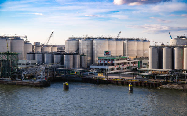 Rotterdam, Netherlands - April 1, 2024: The extensive Vopak oil storage tanks line Rotterdams waterfront, showcasing the citys significant role in global fuel storage and logistics.