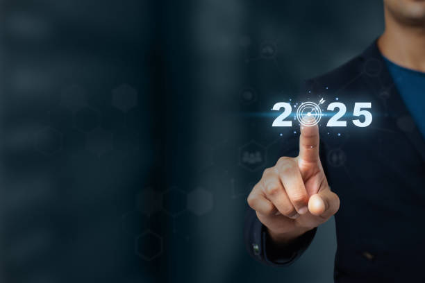 istock Businessman pointing at futuristic 2025 target 2181538685