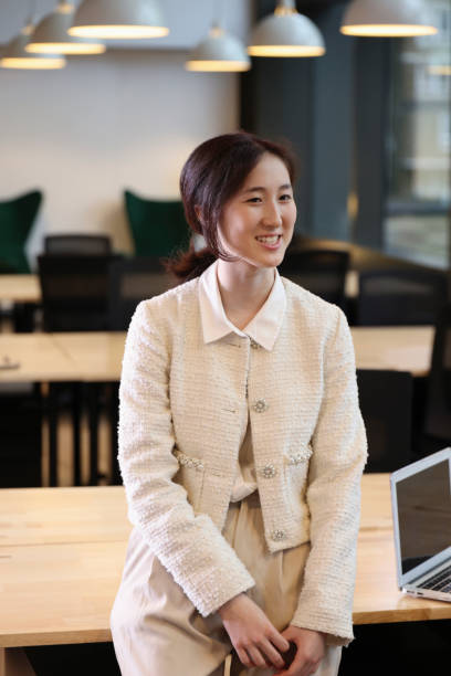 istock Smiling woman in office 2181544521