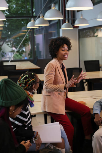 istock Woman talking during meeting in office 2181544674
