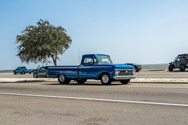 Gulfport, MS - October 04, 2023: Wide angle front corner view of a 1966 Ford F100 Fleetside Pickup Truck at a local car show.