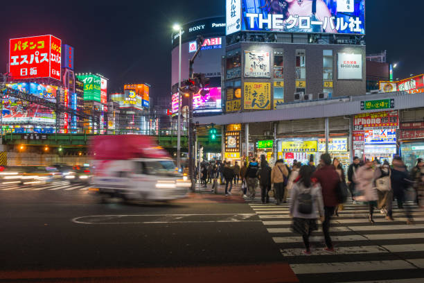 istock Tokyo crowds of shoppers commuters rush hour traffic neon night 2181552757