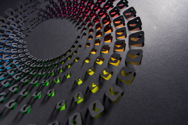 istock Intricate Paper Cutout Design with Arrow Icons in Rainbow Gradient on Dark Background 2181552768
