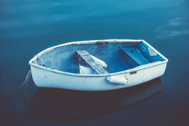 istock Nautical Row Boat in Maine calm blue water 2181554578