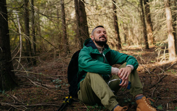 istock Meditation in the middle of the forest 2181557402