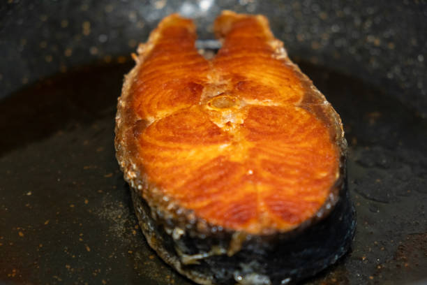Close-up of fresh Norwegian salmon on a rotating background