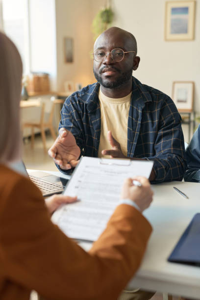 istock Black Man Dring Consultation on Law 2181559384