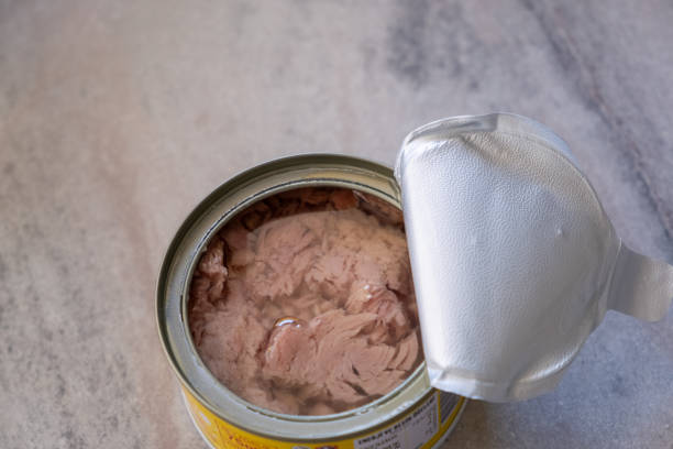 istock close-up canned tuna on wooden background 2181560751