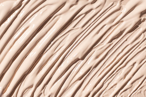 istock Face foundation texture, beautiful unusual beige abstract background. 2181561083