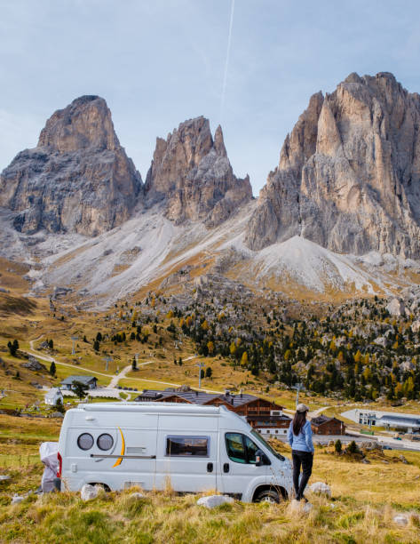 istock Exploring the breathtaking Dolomites in a camper van during golden autumn afternoons 2181561313