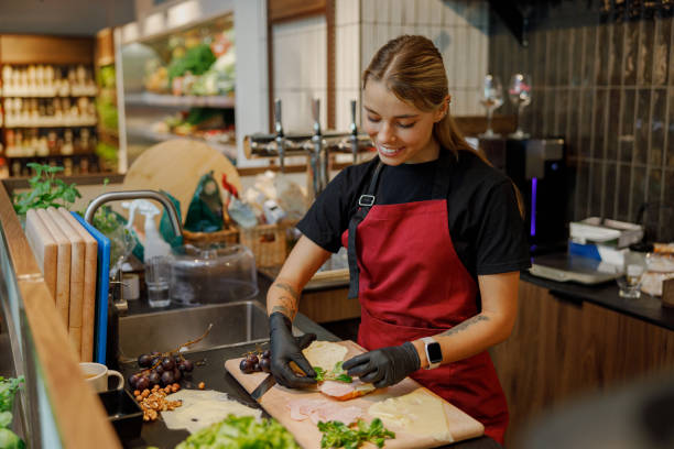 A Young Chef Skills at Preparing Fresh Ingredients in a Bright, Modern Kitchen Setting