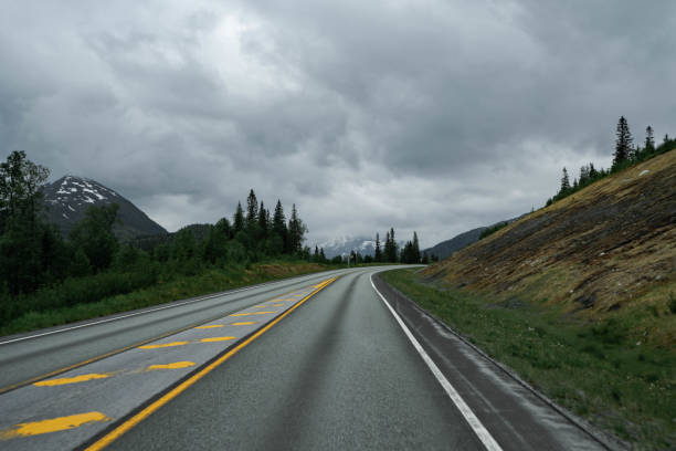 istock Empty road in a moody norway mountain landscape 2181566103