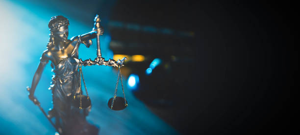 istock Lady justice. Statue of Justice in library 2181566776