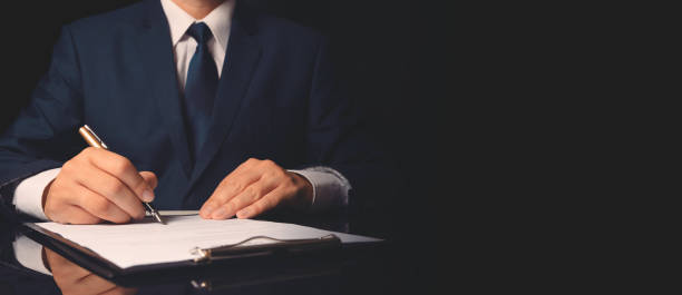 istock Notary public signing paper contract 2181566802