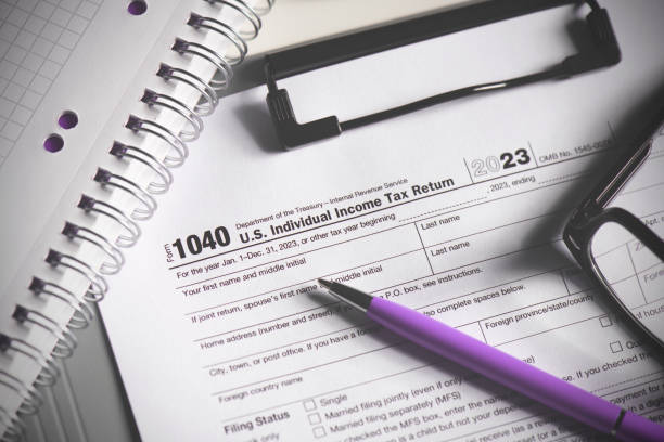 istock US Tax form is on a table 2181566847