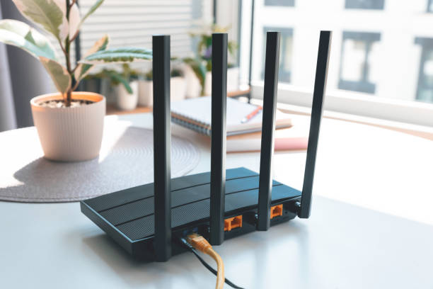 istock Black wifi router with four antennas 2181566883