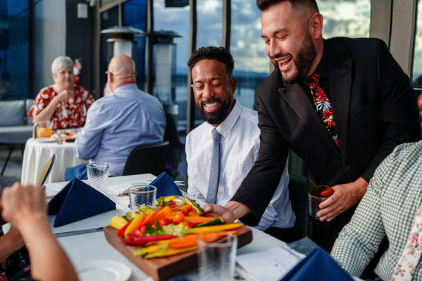 istock Waiter serving appetizers to guests 2181566896