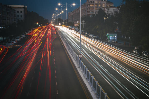 istock Blurred car traffic light at night city. Traffic jam in evening rush hour. 2181569491