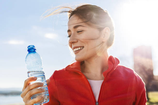 istock Morning Run Interrupted for a Hydration Break by the Water 2181569534