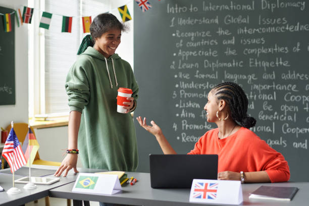 istock Young Women Chatting in Multicultural School 2181570241