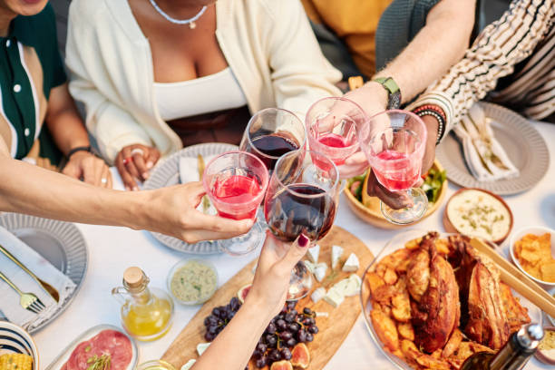 istock Friends Clinking Wine Glasses Enjoying Drinks 2181572713