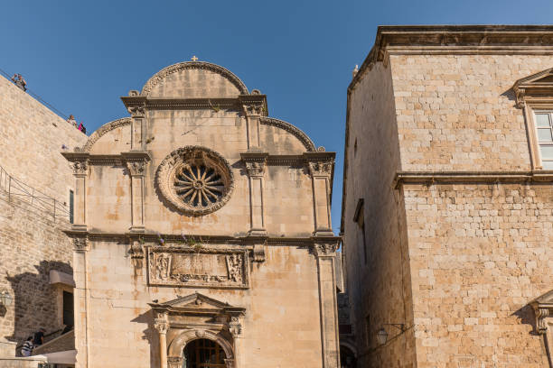 istock Dubrovnik stone church with a bell tower. Medieval churches 2181573598