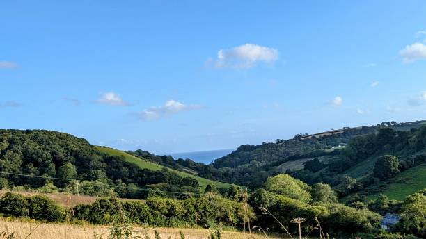 istock Countryside hills overlooking the sea 2181574109