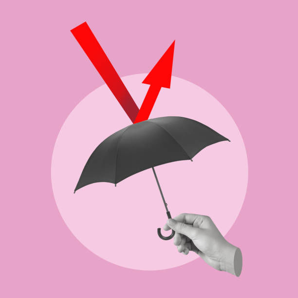 istock Hand holding an umbrella that protects from an arrow. 2181575625