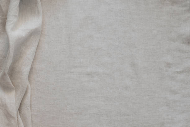 istock Abstract linen fabric texture background. Natural light brown hue dyed linen fabric background. Top view 2181575993