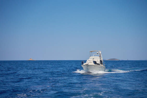 Luxurious motorboat in sea on summer day. Summer vacation and tourism