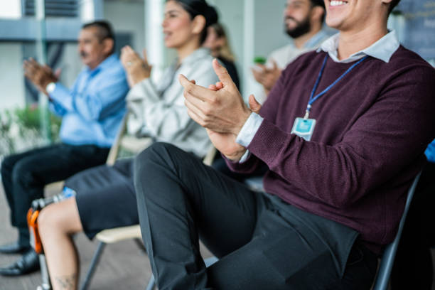 istock Close-up of businessman clapping at office 2181582014