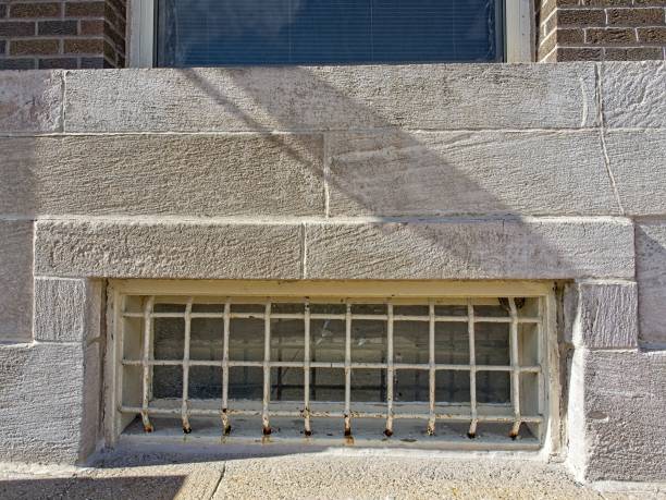 istock Basement window in old stone block architecture in West Branch Iowa 2181584945