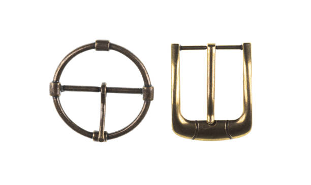 Seamless isolated photo of black colored leather belt straps with steel rivets or buttons on white background.